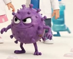 Plaqo, a mischievous purple plaque germ with a cheeky grin